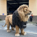 Charger l'image dans la visionneuse de la galerie, Large lion costume on a street with a person in the background