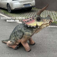 Load image into Gallery viewer, Dinosaur costume on a person walking on a street