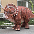 Load image into Gallery viewer, Dinosaur costume with horns and spikes on a street
