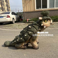 Load image into Gallery viewer, Large dinosaur costume on a street with buildings and cars in the background