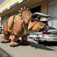 Load image into Gallery viewer, two Person in a dinosaur costume standing next to a car on a street