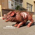 Load image into Gallery viewer, A highly detailed, realistic fake pig prop with a bloody, gory wound effect on its back and exposed rib details, walking on asphalt in front of a building.