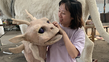 white dragon puppet from MCSDINO team