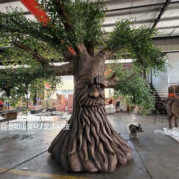 Wooden sculpture of a tree with a face in an indoor setting