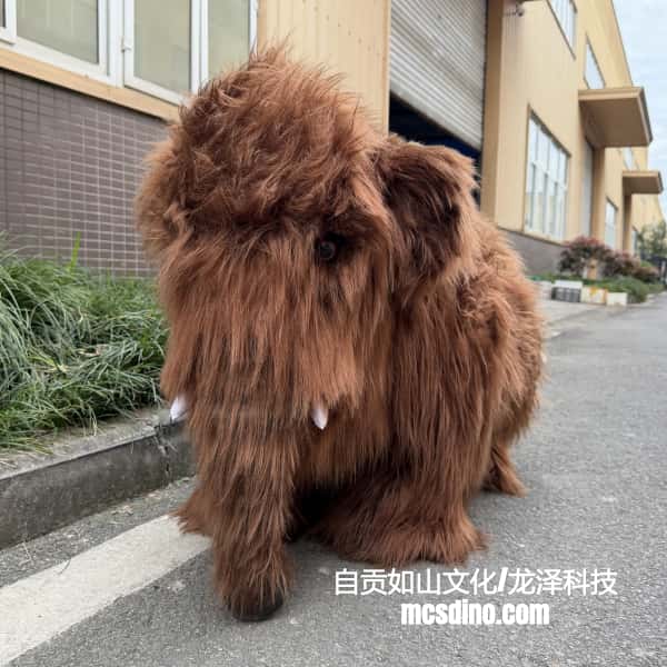 Brown furry creature on a street with buildings in the background