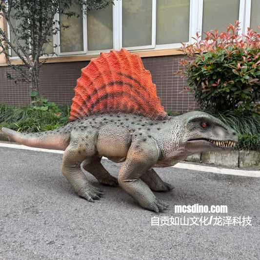 Model of a dinosaur with a red sail on a street