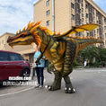 Load image into Gallery viewer, Person standing next to a large dinosaur costume on a city street
