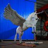  white animatronic unicorn model