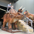 Load image into Gallery viewer, kid riding triceratops Dino ride
