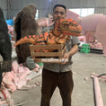Load image into Gallery viewer, Tiger Strips Raptor In Crate Dino Puppet
